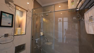 Shower, free toiletries, towels, soap