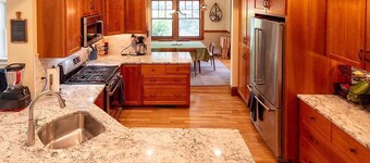 Charming, sunny 4-bedroom home with wooded yard in family-friendly Newton