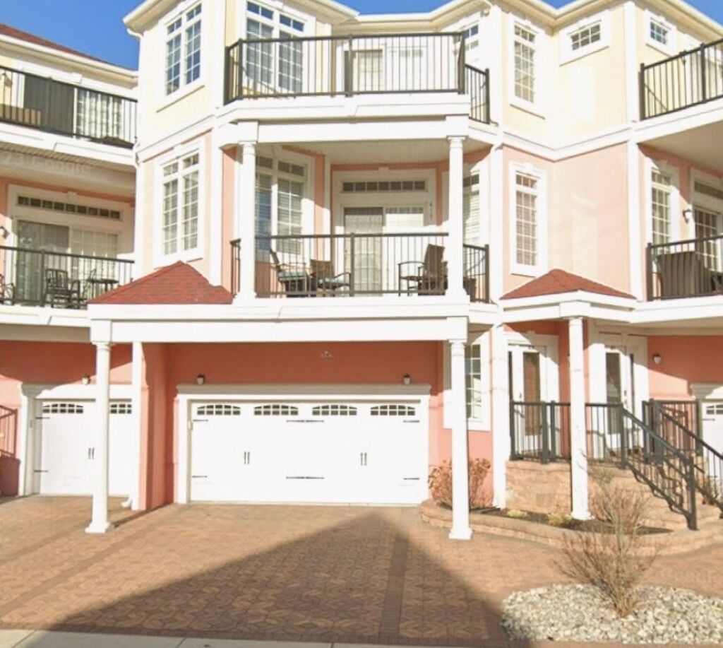 Charming 3-BR Condo with Ocean View - Only ONE Block from Beach!