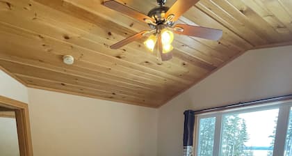 Desirable 3-bedroom apartment with AC and WiFi steps from Pristine Schoodic Lake