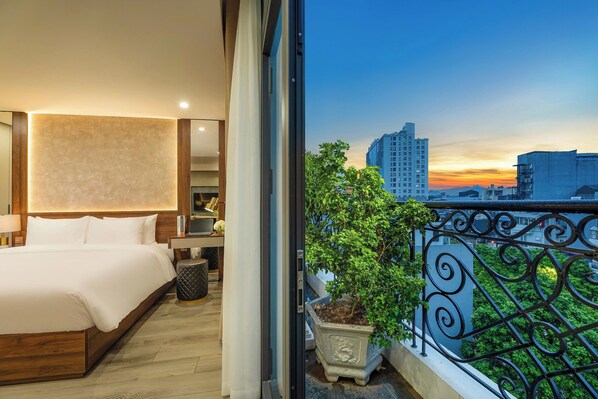 Grand Room, Balcony, City View | Minibar, in-room safe, desk, laptop workspace - Gilson Hanoi Hotel (Hanoi)