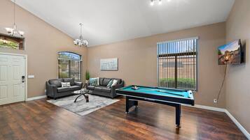 Smart TV, fireplace, ping pong, books