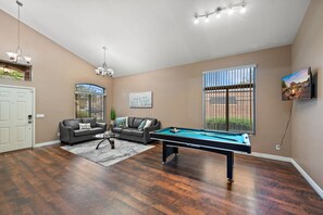 Smart TV, fireplace, table tennis, books