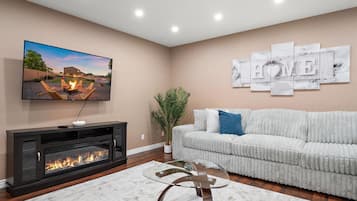 Smart TV, fireplace, table tennis, books