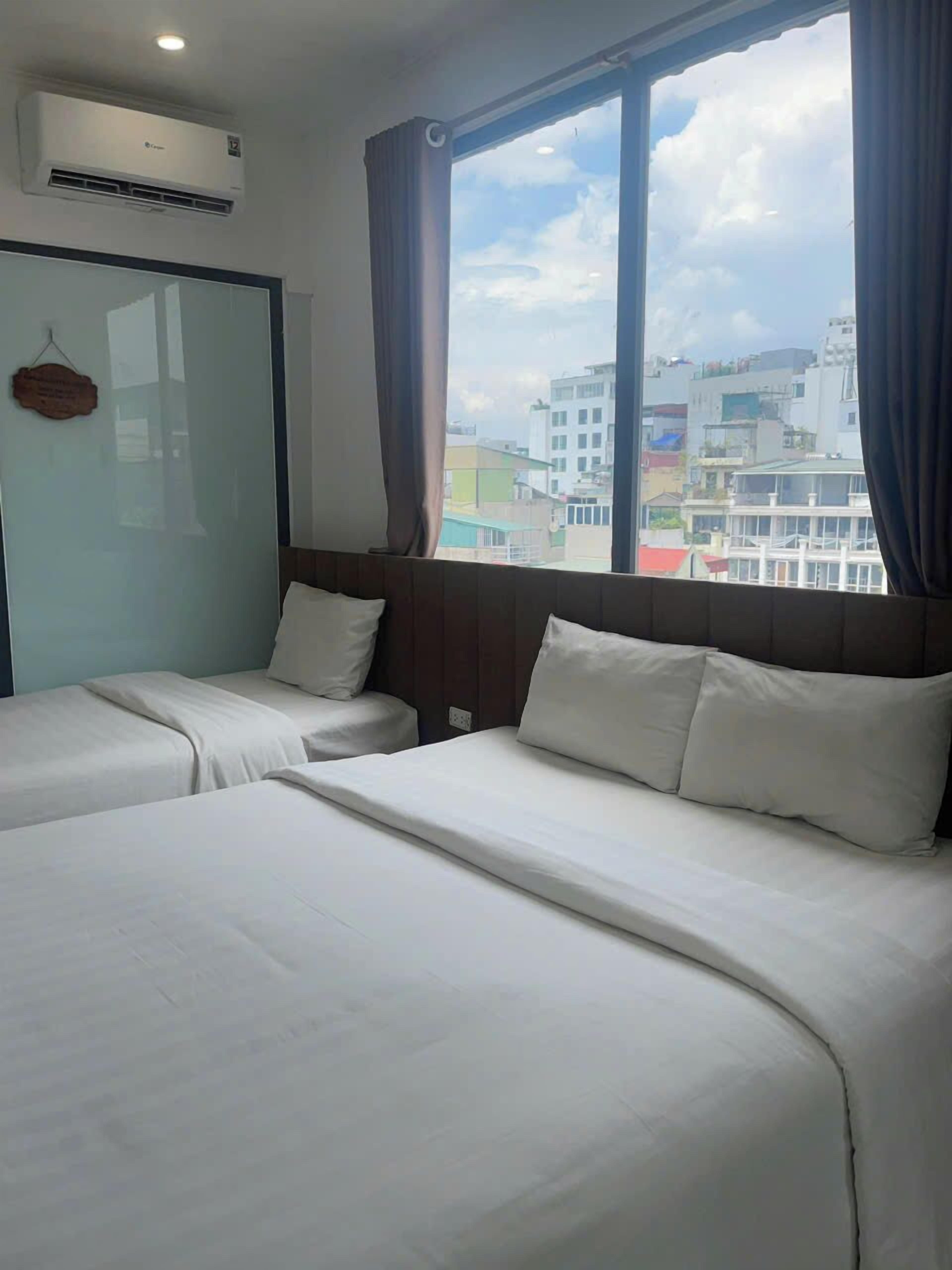 Deluxe Twin Room, City View | In-room safe, soundproofing, iron/ironing board, free WiFi
