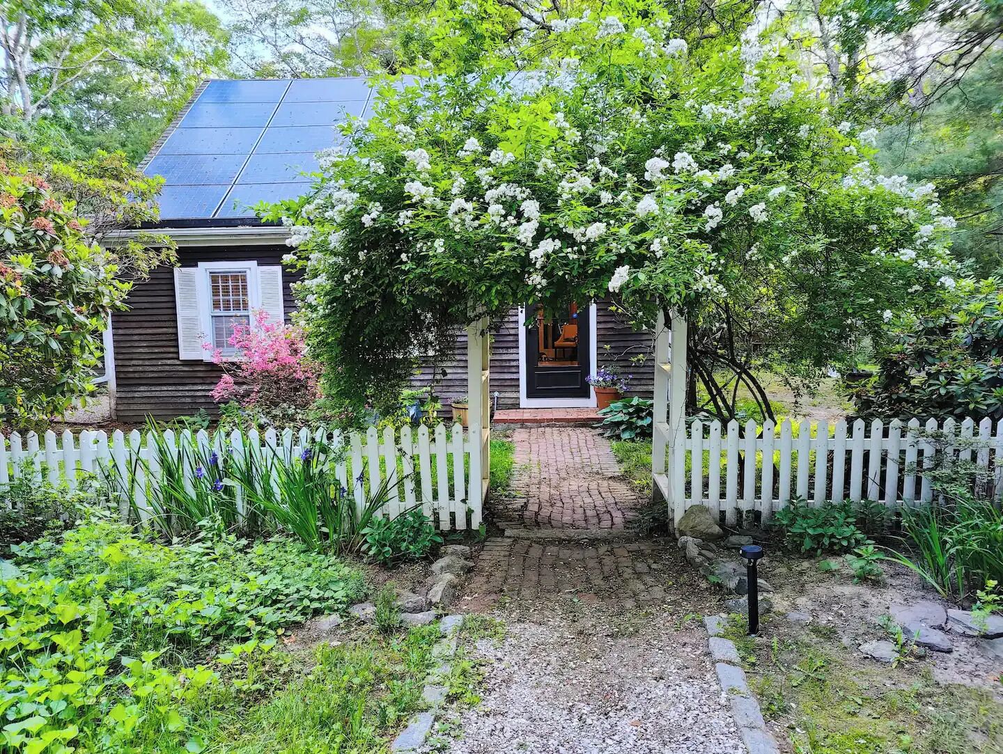 3-bedroom cozy garden retreat in Mashpee with AC, work spaces, fenced in yard