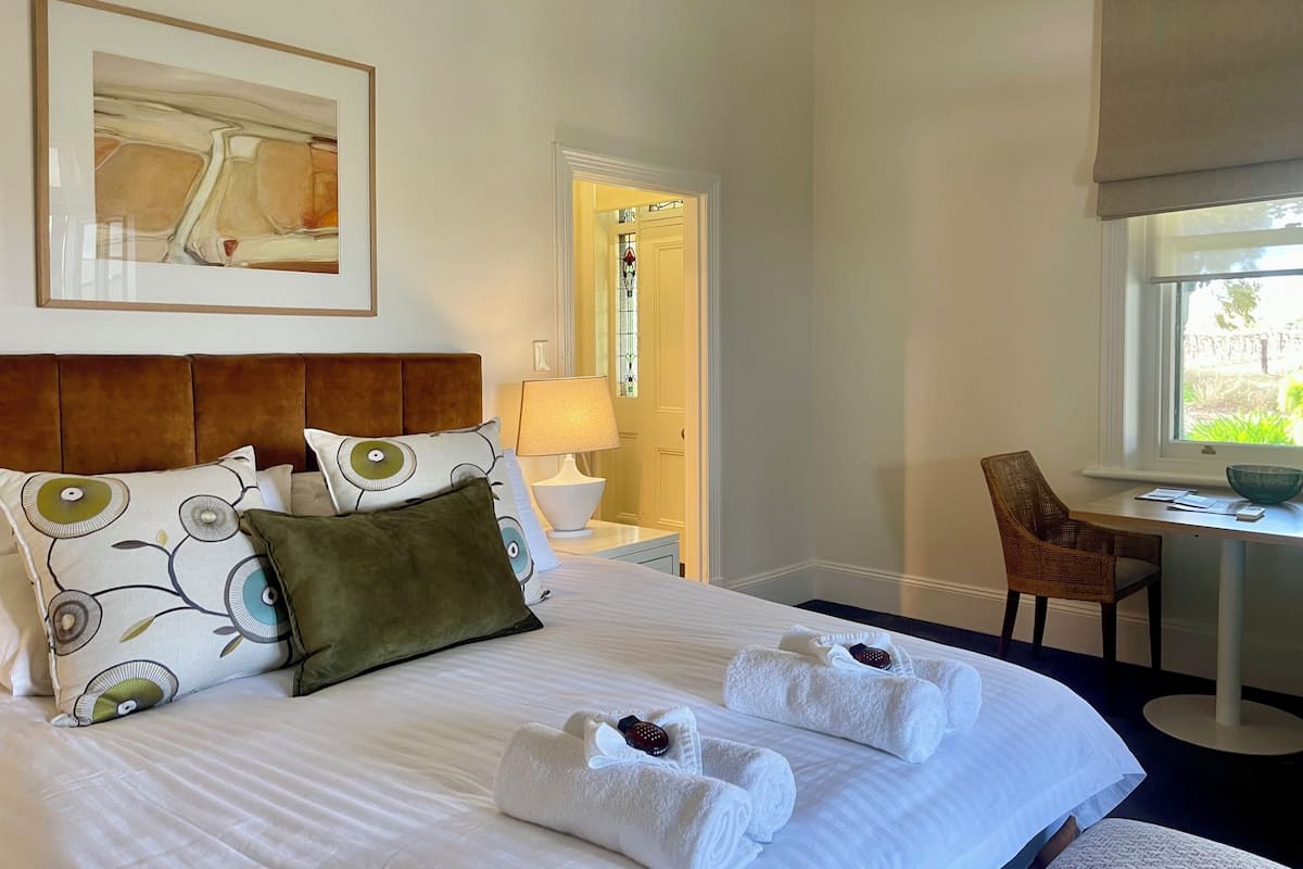 Suite monolocale Luxury, vista giardino | 1 camera, tende oscuranti, ferro/asse da stiro, Wi-Fi gratuito