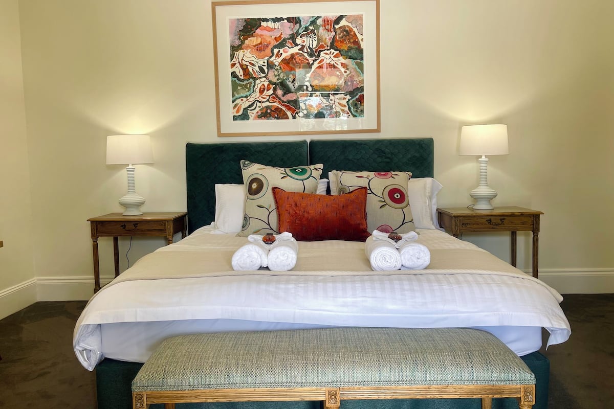 Suite monolocale, vista giardino | 1 camera, tende oscuranti, ferro/asse da stiro, Wi-Fi gratuito