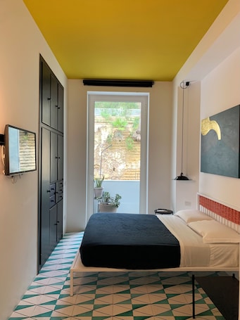 Superior kamer | Een kluis op de kamer, een strijkplank/strijkijzer, gratis wifi