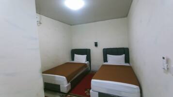 Kamar Twin Deluks | Kedap suara, Wi-Fi gratis, dan seprai linen