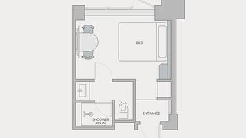 A floor plan with a bedroom, bathroom, and shower room.