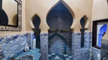 Shower, towels, soap, shampoo