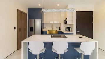 Fridge, microwave, stovetop, coffee/tea maker