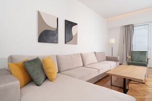 Deluxe Apartment, 3 Bedrooms, Balcony, City View | Living room | 50-inch TV with cable channels - Kolonaki Elegant Apartment with Balcony (Athens)