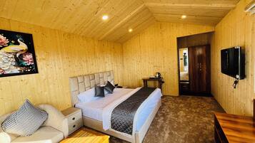 Deluxe Cottage, Resort View | 1 bedroom, desk, laptop workspace, free WiFi