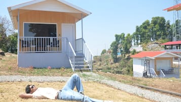 Deluxe Cottage, Resort View | 1 bedroom, desk, laptop workspace, free WiFi