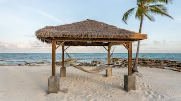 On the beach, sun loungers, beach towels