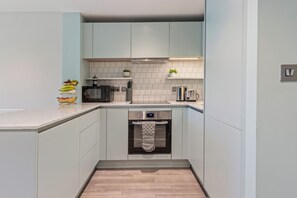 Fridge, microwave, stovetop, dishwasher - Vibrant One Bed Apartment in Wembly by MySquare (Wembley Park)
