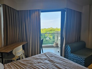 Standard Studio, 1 Double Bed with Sofa bed, Kitchen, Partial Ocean View | Balcony - Tambuli Tower C Unit 5D (Lapu-Lapu)