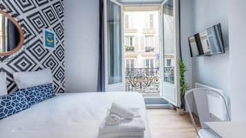 Coffres-forts dans les chambres, fer et planche Ă repasser