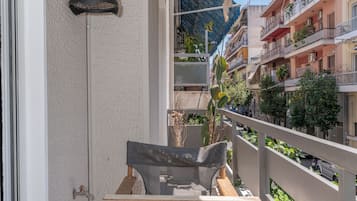 Apartamento superior, 2 quartos, cozinha, vista para a cidade | Sacada