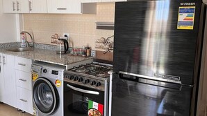 Apartment | Private kitchen | Fridge, microwave, oven, stovetop - Red Sea Ocean View Apartment (Sharm El Sheikh)