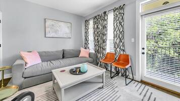 Condo, Multiple Beds (Topsail Village 322) | Living area | TV