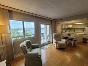 Condo, 1 Queen Bed (Pinnacle Port A-305) | Living area | TV