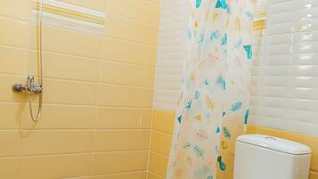 Shower, towels, toilet paper