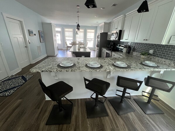 Fridge, microwave, oven, stovetop - Entire 3 Bedroom Home in North Beach Tybee Island with Golf Cart Included (Tybee Island)