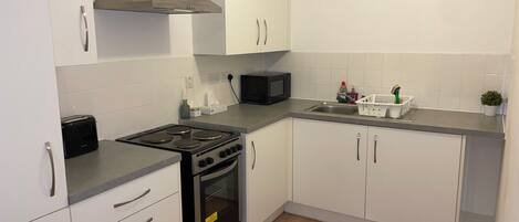 Apartment | Private kitchen | Fridge, microwave, oven, stovetop