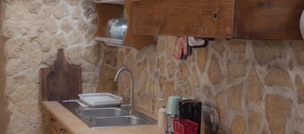 The oven home Restored Old House in the quiet Historic Center of Codrongianos.