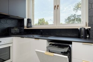 Monolocale, cucina | Cucina privata | Microonde, macchina per tè/caffè, tavolo da pranzo