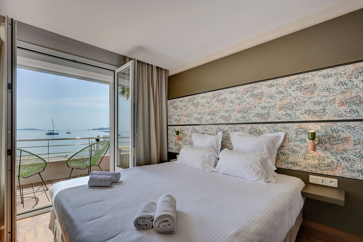 Chambre Double Exécutive Vue Mer | Tallelokero huoneessa, ilmainen Wi-Fi, vuodevaatteet