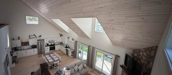 Big Pine Lakefront Retreat with Private Beach, Dock, Fire Pit & Sunset Views