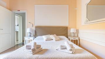 1 chambre, coffres-forts dans les chambres, fer et planche à repasser