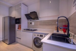 Apartment | Private kitchen | Fridge, microwave, oven, stovetop