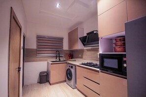 Apartment | Private kitchen | Fridge, microwave, oven, stovetop