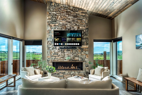 Warm, inviting living area with a fireplace—perfect for unwinding.