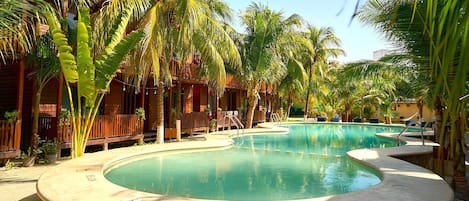 Outdoor pool, open 7:00 AM to 10:30 PM, sun loungers
