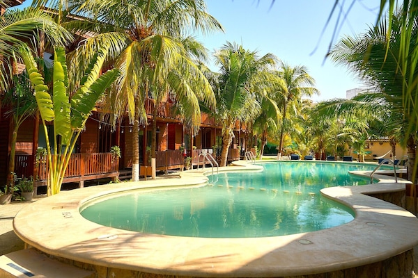Outdoor pool, open 7:00 AM to 10:30 PM, sun loungers