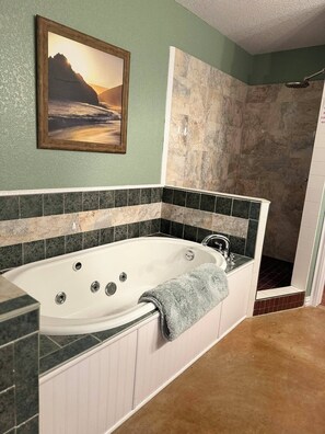 Jetted tub, hair dryer, towels, soap