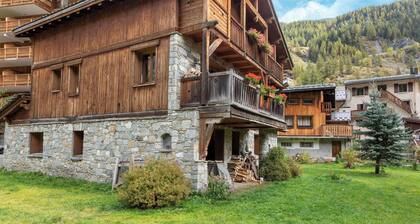 Casa-Chalet Brizolée avec vue sur le lac à Tignes