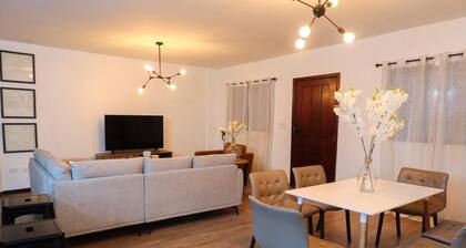 Renovated and cozy 2-bedroom apartment with AC, WiFi in vibrant San Pedro Sula