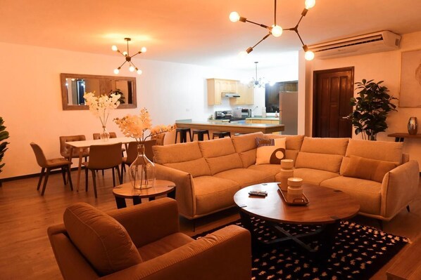 Living area - Renovated and cozy 2-bedroom apartment with AC, WiFi in vibrant San Pedro Sula (San Pedro Sula)