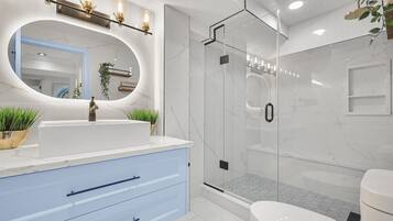 Shower, hair dryer, towels, soap
