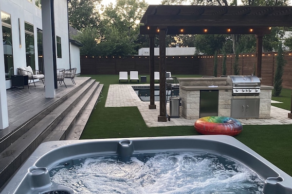 Enjoy relaxing in the large Hot Tub!