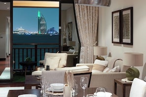 Enjoy a city view from the balcony, where you can relax in the seating area with a sofa and armchairs.