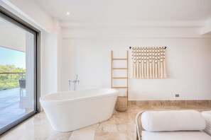 Shower, hair dryer, towels, soap
