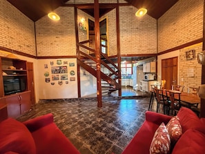 Bangalô família, vista para o jardim | 1 quarto, frigobar, Wi-Fi de cortesia